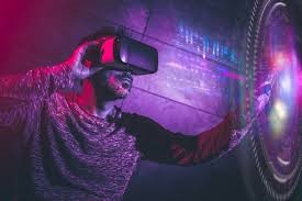 Person using virtual reality headset with colorful digital graphics, symbolizing technology and innovation in law.